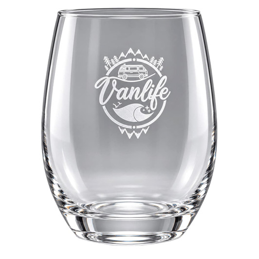 A clear stemless wine glass featuring an etched design related to "Vanlife" and outdoor themes.