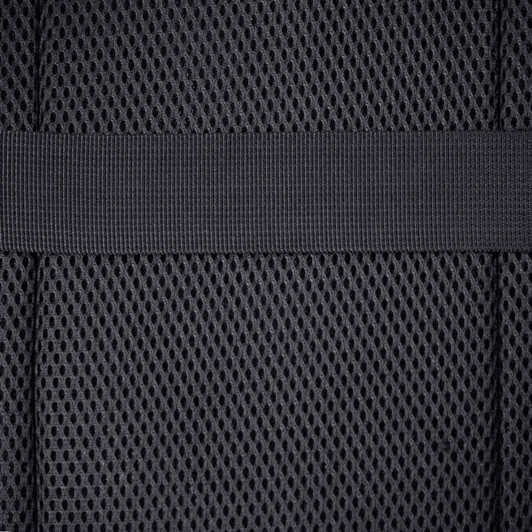 A textured black mesh material with a solid black strap, suitable for a backpack design.
