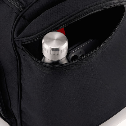 A black travel duffel featuring a zippered pocket with a silver drink bottle and a phone inside.