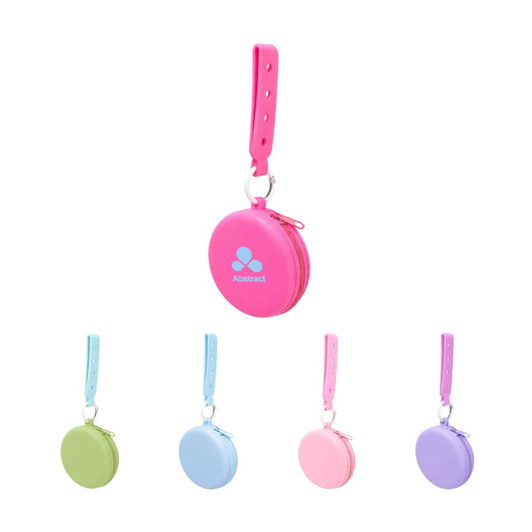 A collection of silicone pouches in pink, blue, and purple, each with a strap and a logo.