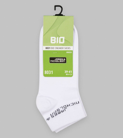 White organic sneaker socks with a label featuring a logo, hang tag, and sizing information.