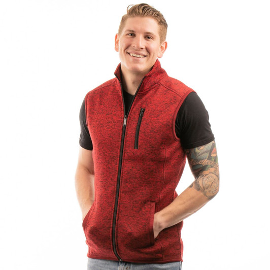 A red sweater knit vest with a full zip and pockets, worn over a black T-shirt by a smiling model.
