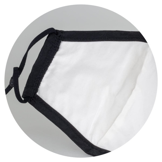 A Luxe Face Mask in black and white, featuring adjustable ear loops and a soft inner lining.