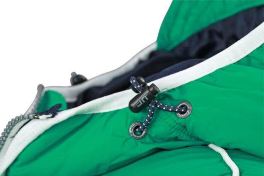 A close-up of a green maritime vest featuring a zippered collar and drawstring adjustments. It includes a logo.