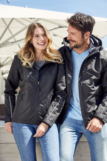 A black ladies' 3-in-1 jacket with a hood, displayed on a woman and a man outdoors. The woman is smiling.