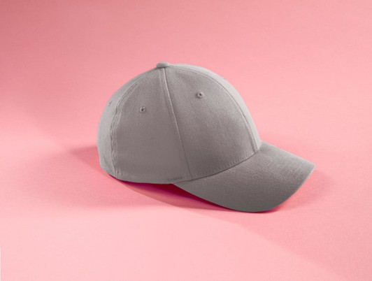 A grey cap with a curved brim and a branding logo, displayed against a pink background.