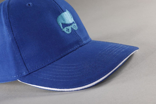 A blue cap with a curved brim and a logo on the front. Features contrast stitching along the brim.