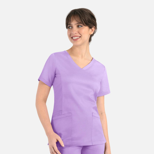 A purple women's curved mock wrap top featuring short sleeves and two front pockets, with a logo present.