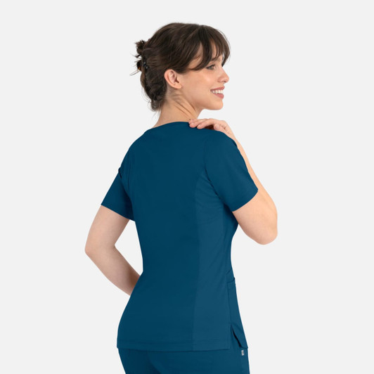 A women's curved mock wrap top in teal, featuring short sleeves and a fitted design, with a logo on the back.