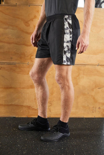Men's sports shorts in black with a patterned side panel, showcasing a comfortable fit and an elastic waistband.