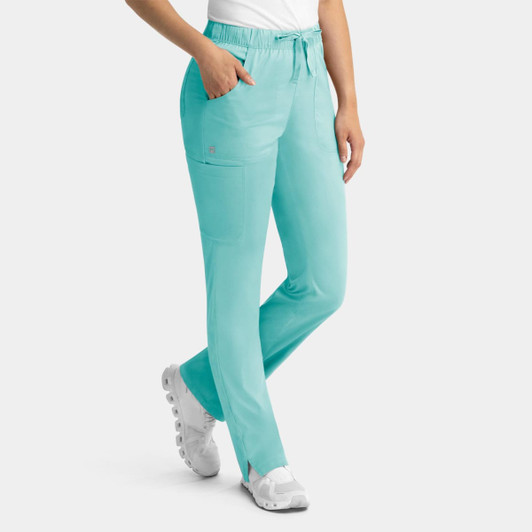 A pair of aqua women's cargo pants with a full elastic waistband and multiple pockets, worn with white shoes.