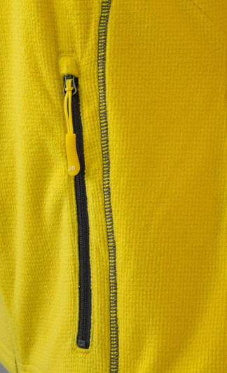A yellow polar fleece jacket featuring a zippered pocket on the side. It has a textured fabric design.