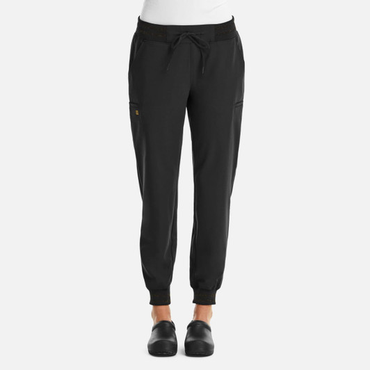A pair of black joggers with elastic cuffs, featuring a drawstring waist and metallic detail. The design includes side pockets.