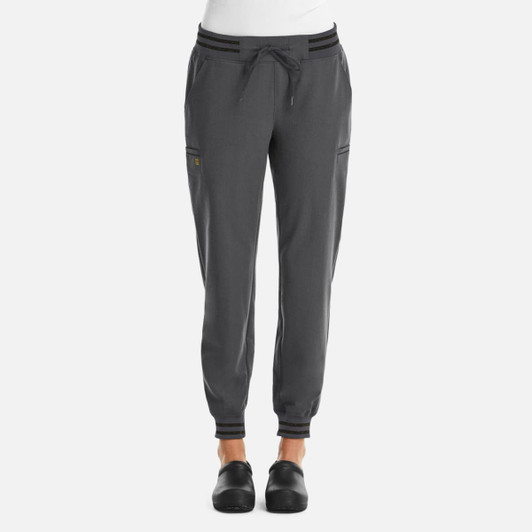 A pair of women's joggers in dark grey with metallic detailing and elastic cuffs, featuring a drawstring waist.