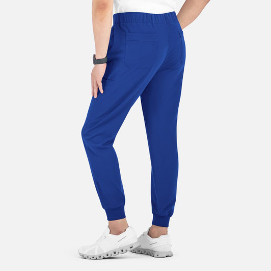 A pair of blue joggers with a full elastic waistband and cuffed ankles, featuring back pockets and a logo.