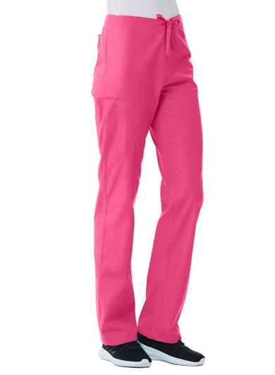 A pair of unisex pull-on pants in bright pink, featuring pockets and a drawstring waistband.