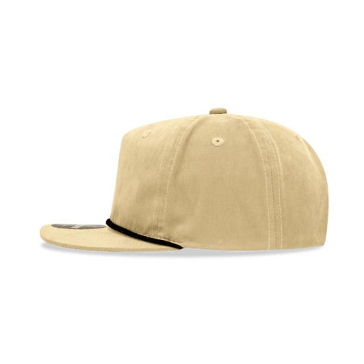 A beige 5 panel high profile relaxed rope hat featuring a black trim and a logo on the front.