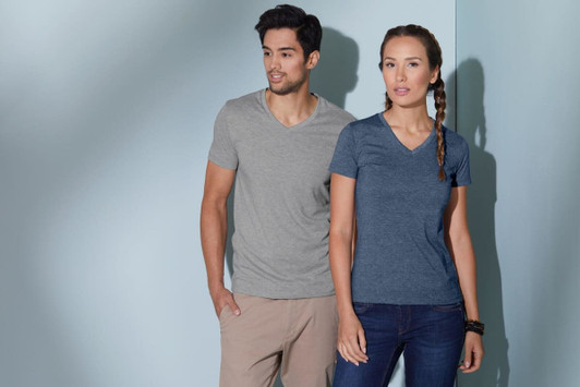 A grey and a navy women's heather T-shirt are displayed on models against a light blue background. The shirts have v-neck designs.
