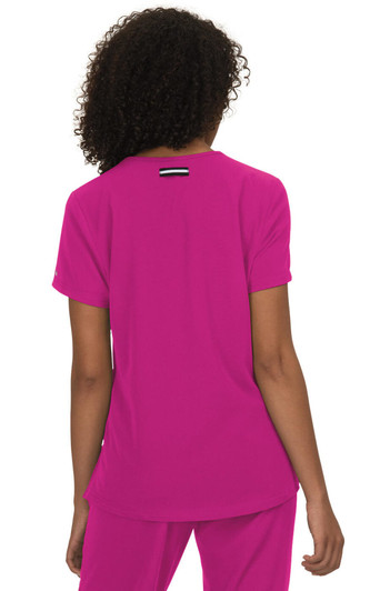 A pink top with a simple design and a logo on the back, featuring a relaxed fit and short sleeves.