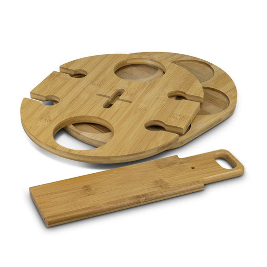 A bamboo wine rack featuring a circular design with cut-out sections for bottles and a separate flat bamboo piece.