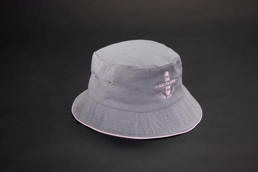 A grey bucket hat featuring a logo and a pink accent on the brim.