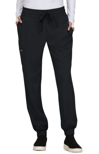 A pair of black jogger pants featuring an elastic waistband and side pockets, with a small logo on one side.
