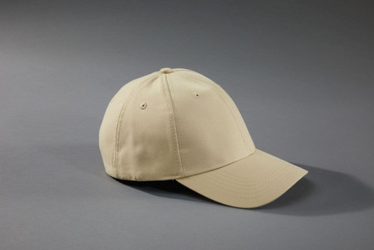 A beige 6-panel cap with a curved brim and ventilation holes. It features a logo on the front.