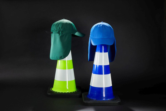 A green and a blue 6 panel cap with neck guards displayed on traffic cones against a dark background.