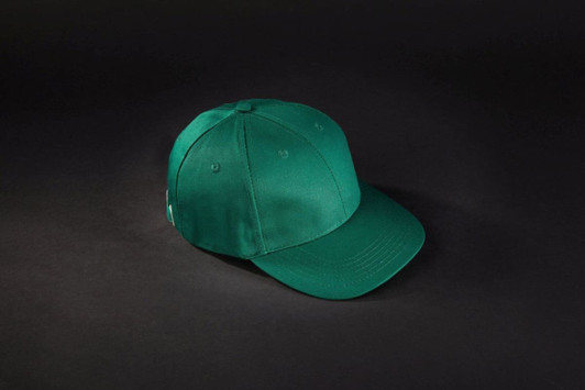 A green 6 panel workwear cap with a curved brim and a logo on one side.