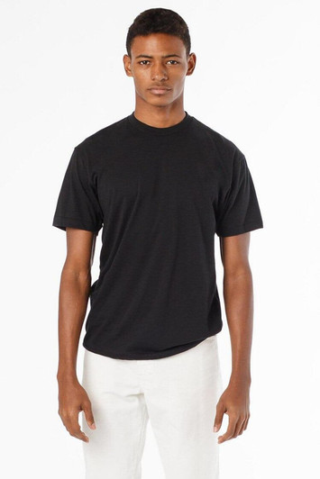 A black short sleeve cotton poly crew tee worn by a model standing against a plain white background.