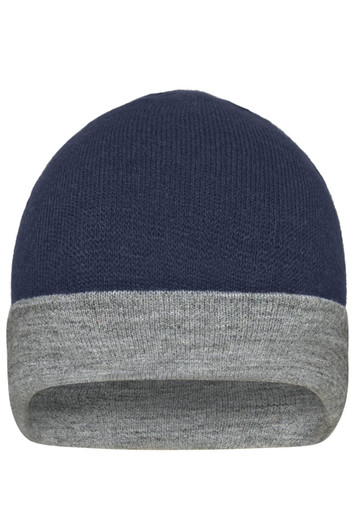 A reversible beanie featuring a blue top and a grey cuff, with a logo displayed on one side.