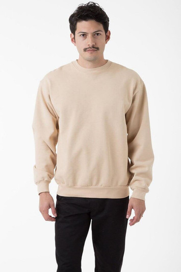 A beige heavy fleece pullover featuring a crew neckline and long sleeves, modelled by a man.