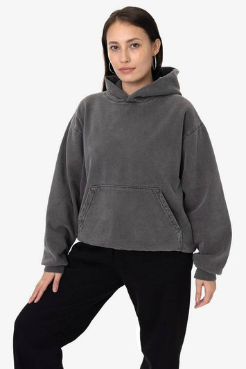 A heavy fleece hooded pullover in a grey colour, featuring a front pocket and relaxed fit. It has a logo present.