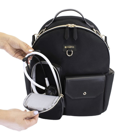 A black utility backpack with a gold zipper, featuring a stethoscope, pocket, and interior compartments.