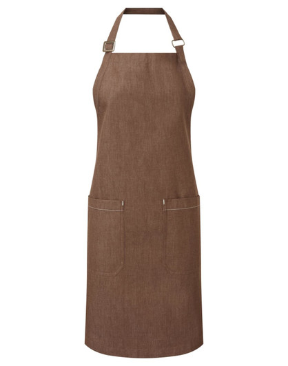 A brown organic denim bib apron featuring adjustable straps and two front pockets, with a logo on the side.