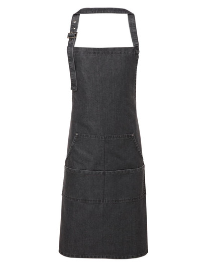 A dark denim bib apron with adjustable straps and three front pockets. Features a logo on the apron.