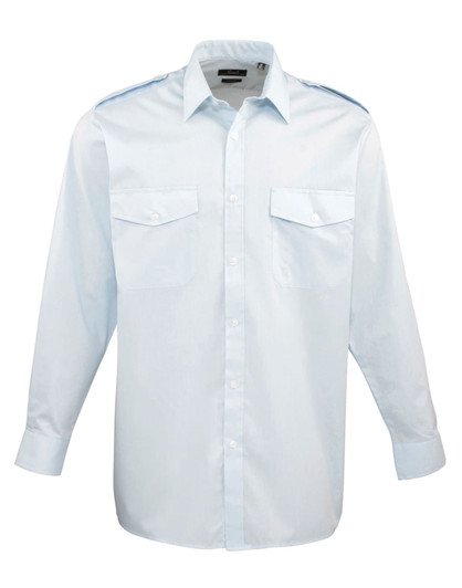 A light blue button-up shirt with long sleeves and two chest pockets. The shirt features a logo on the collar.