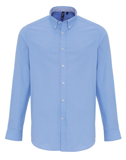 A light blue cotton-rich Oxford button-up shirt with a collar and long sleeves. It features a logo.