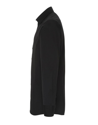 A black Stretch Fit Cotton Poplin long-sleeve shirt displayed from the side, featuring a button-up design and a logo.