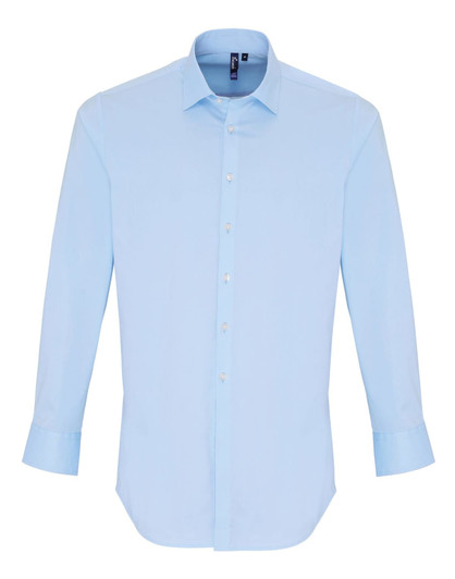 A light blue button-up shirt with long sleeves, featuring a collar and a logo.