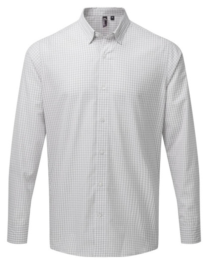 A button-up shirt in light grey with a check pattern, featuring long sleeves and a collar. Contains branding.