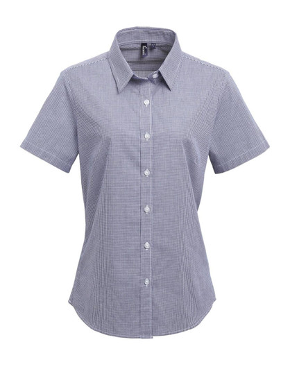 A women's short-sleeve button-up shirt in microcheck pattern, featuring a collared neckline and buttons in navy and white.