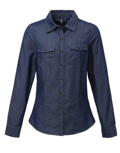 A women's button-up shirt in dark denim with a fitted design and two chest pockets, featuring a branded logo.