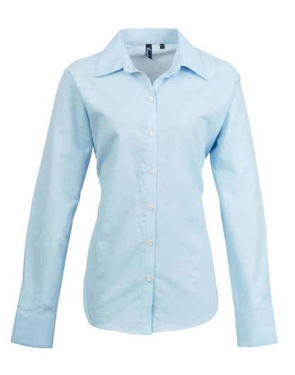 A light blue women's button-up Oxford shirt with long sleeves and a collar, featuring a logo.