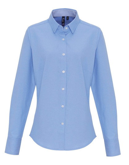 A light blue button-up blouse with a collared neck and long sleeves, featuring a logo.