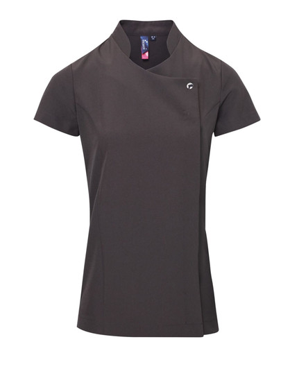 A brown tunic with a stylish neckline and short sleeves, featuring a logo on the side. Perfect for beauty and spa professionals.