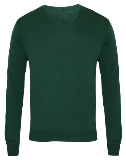 A green V-neck sweater with a fitted design and long sleeves. It features a simple logo on the neck.