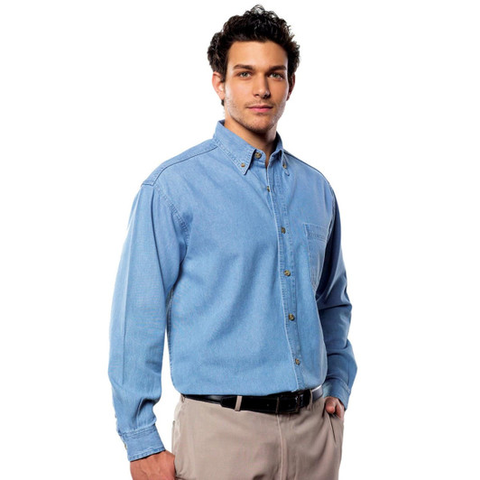 A long sleeve cotton denim shirt in light blue, featuring a button-up design and a chest pocket.