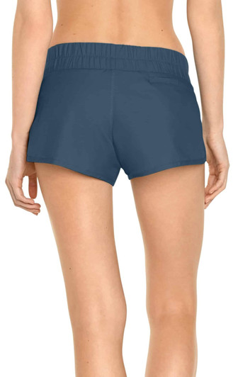 A pair of women's swim shorts in navy blue, featuring an elastic waistband and a small pocket at the back.