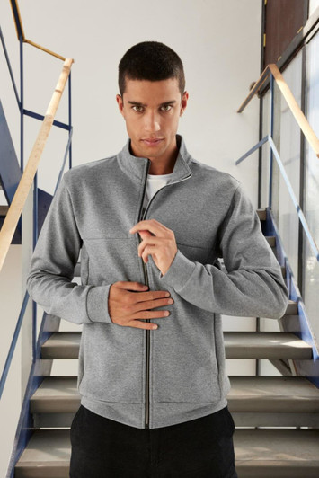 A grey men's track jacket with a zip front, featuring a high collar and a fitted design. It has a logo detail.
